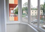 Остекление и отделка балкона с эркерным соединением. Отделка стен панелью вагонка, пол дерево (сосна) mobile